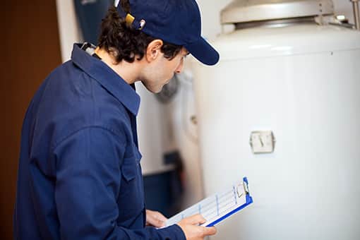 Quakertown Master Plumber Inspecting Newly Repaired Water Heater