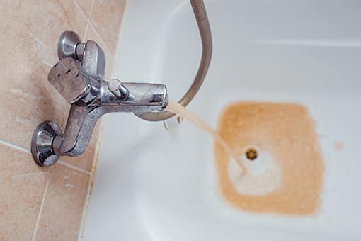 Dirty Water Coming Off Rusty Faucet In Need of Drain Cleaning in Wind Gap Pennsylvania