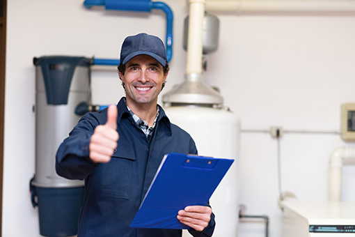 Fountain Hill Commercial Plumber Giving a Thumbs Up After Inspecting Water Heater