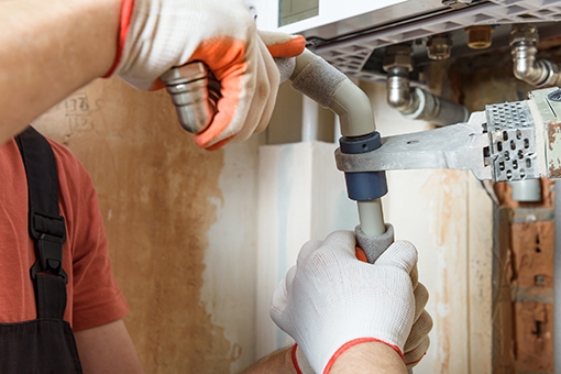 Plumber Soldering Pipe in a Commercial Building in Bath PA