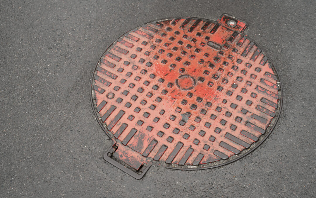 Red color painted Sewer Manhole